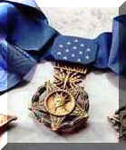 medal4_efficient.jpg (18886 bytes)