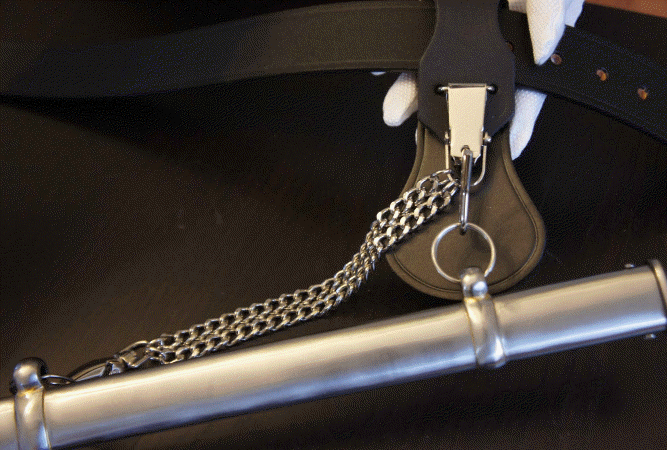 army belt with frog and chain attached to sword